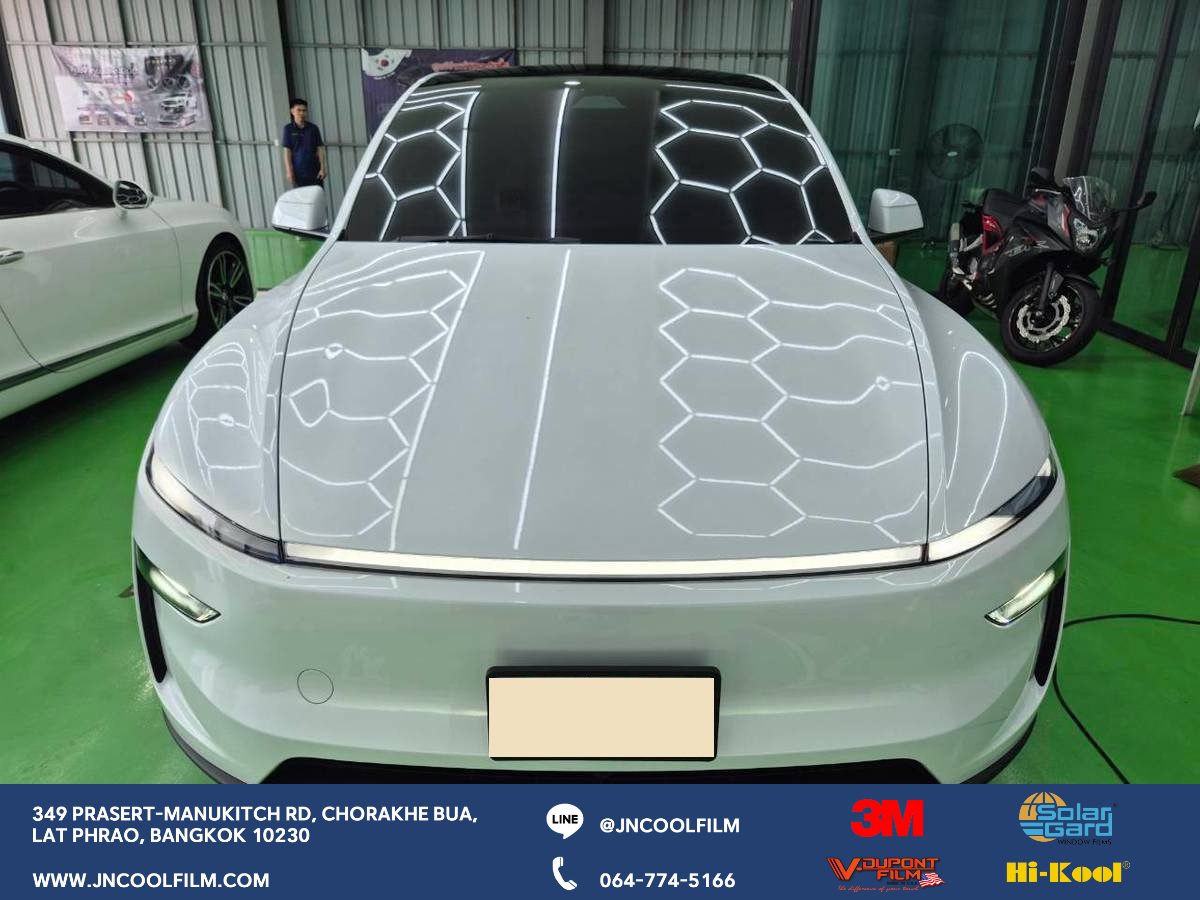 Completed the installation of heat-rejecting window tint on the Tesla Model Y, covering the entire vehicle and the glass roof