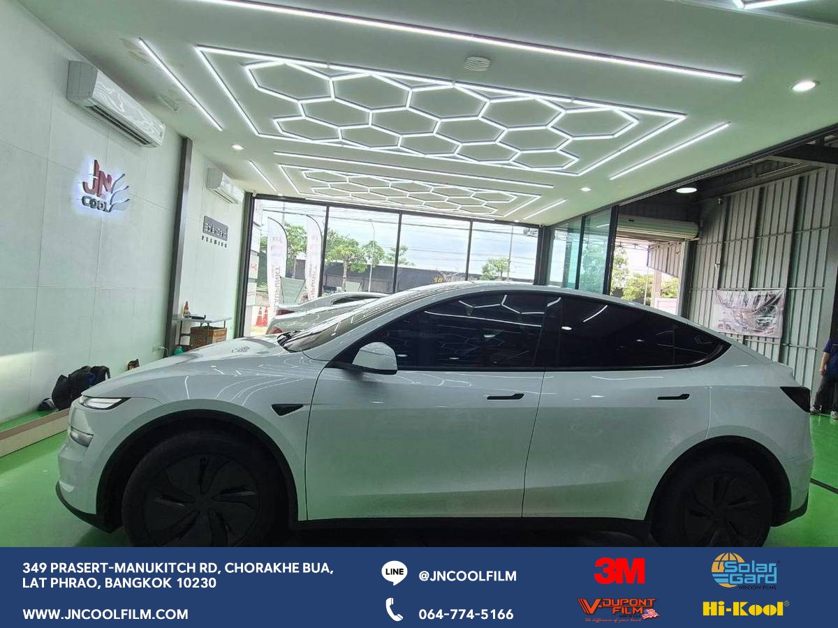 Completed the installation of heat-rejecting window tint on the Tesla Model Y, covering the entire vehicle and the glass roof - photo 1